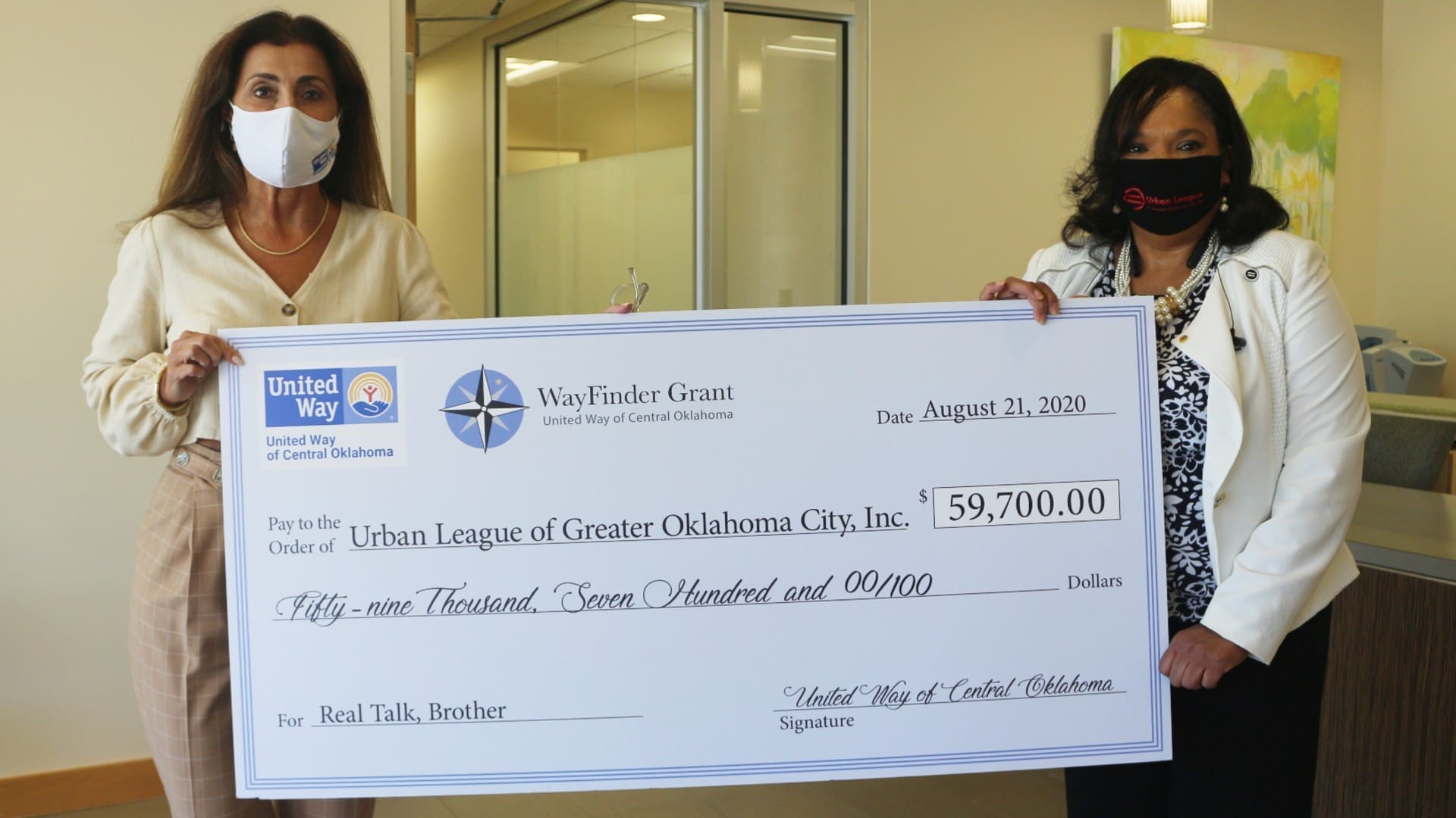 United Way of Central Oklahoma President and CEO, Debby Hampton, awarding Urban League of Greater Oklahoma City's Dr. Valerie Thompson the WayFinder Innovation Grant